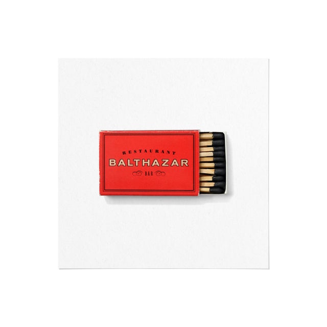 A high-quality framed art print of a vintage 1990s matchbox from Balthazar, the iconic French brasserie on Spring Street...