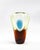 A vase crafted in the renowned Italian Murano glassworks, designed by acclaimed designer Flavio Poli. Made using the...