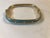 This fabulous 1970s Les Bernard Rectangular Gold Tone Turquoise Enamel Bangle will be a great addition to your vintage...