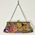 Be the envy of the party season with this stunning Boho Chic embroidered and beaded Clutch Handbag. It features colorful...