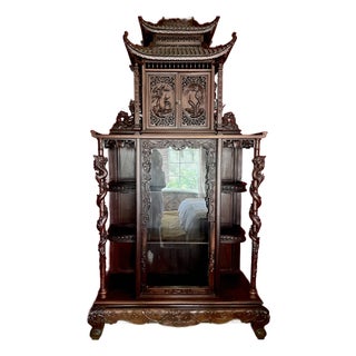Early 20th Century Profusely Carved, Rosewood Display Cabinet in the Orientalist Style For Sale