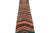 Hand-knotted in wool and originating from Morocco circa 1950-1960, this 2x10 vintage Moroccan rug is an extremely rare...