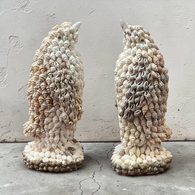 These are Victorian style penguin form bookends or figurines that have been decorated with shells by hand. They were a...