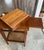 One drawer and a sliding shelf on one side. The lower shelf is caned. It fits easily anywhere: in an entryway, living...