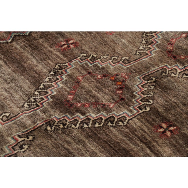 This vintage 4x6 Persian Gabbeh rug is the latest grand entry to Rug & Kilim’s curation of rare tribal pieces. Hand-...