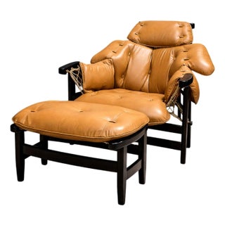 “Jangada” Lounge Chair with Ottoman in Hardwood & Leather, Jean Gillon, 1970s – Lot 213 For Sale
