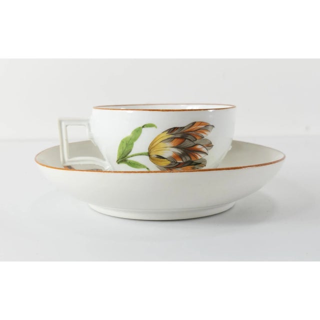 We are selling this extremely fine Meissen Teacup and Saucer. This well decorated pair features a Teacup painted with two...