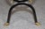 An exceptional and highly sophisticated Maison Jansen attributed brass and blackened metal magazine rack, masterfully...