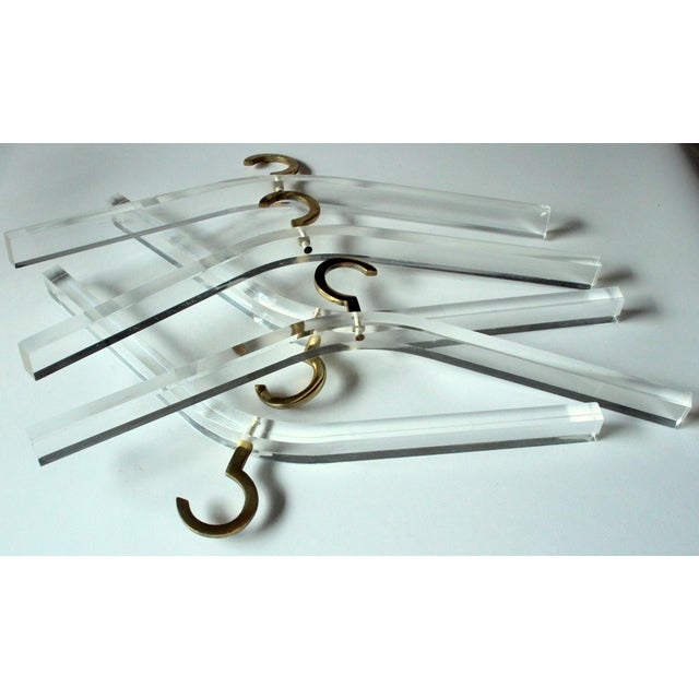 Postmodern acrylic coat hangers with brass hooks - set of 5 - in excellent vintage condition each width approx. 17.7" -...