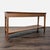 Two drawer walnut table with shelf. Brand: Crate & Barrel. Dimensions (in): 58W x 16D x 29H.