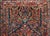 A gorgeous early 20th century Persian Sarouk rug with a large diamond floral medallion living admits a field of more...