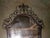 Beautifully detailed patinated Neoclassical style bronze mirror by Oscar Bach, circa 1920. See signature in photos. This...