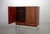 This beautiful high quality finished midcentury Dutch design rosewood cabinet is attributed to the German designer Rudolf...