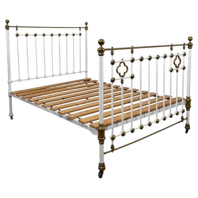 An impressive and increasingly difficult-to-find 19th-century Victorian king-size bed, beautifully constructed in brass...