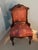 A matched pair of American/Victorian Renaissance Revival black walnut parlor chairs, circa 1870–1875, attributed to New...