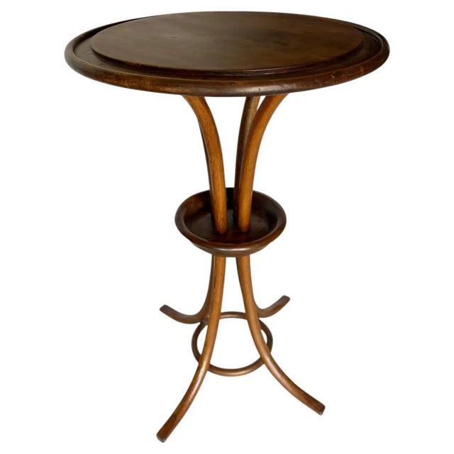 Found in the South of France, this Early 20th Century French Bentwood Side Table was crafted in the Thonet style and dates...