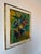 A vibrant 1980s mixed media still life by artist Rhonda, featuring a colorful bouquet arranged in a vase with expressive...