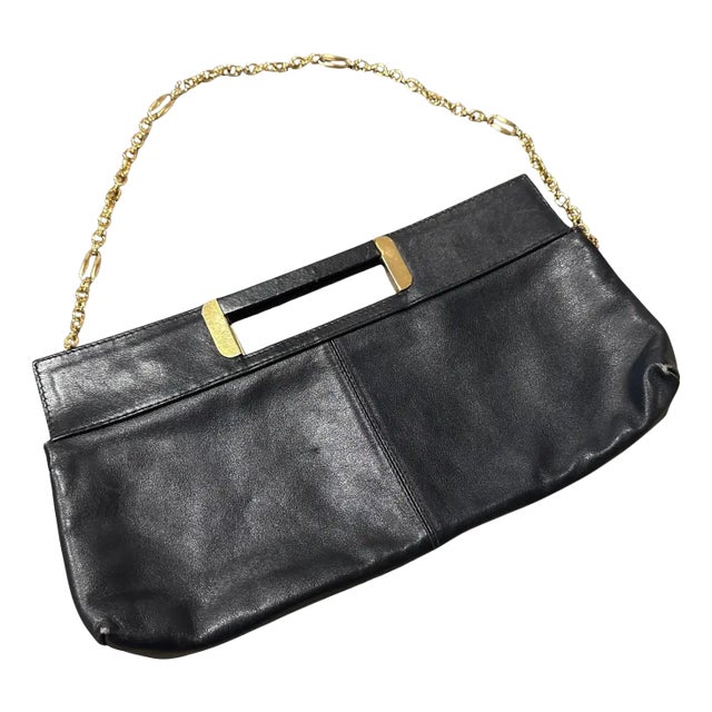 A 1970s High Quality Black Leather and Brass Italian Shoulder Bag For Sale