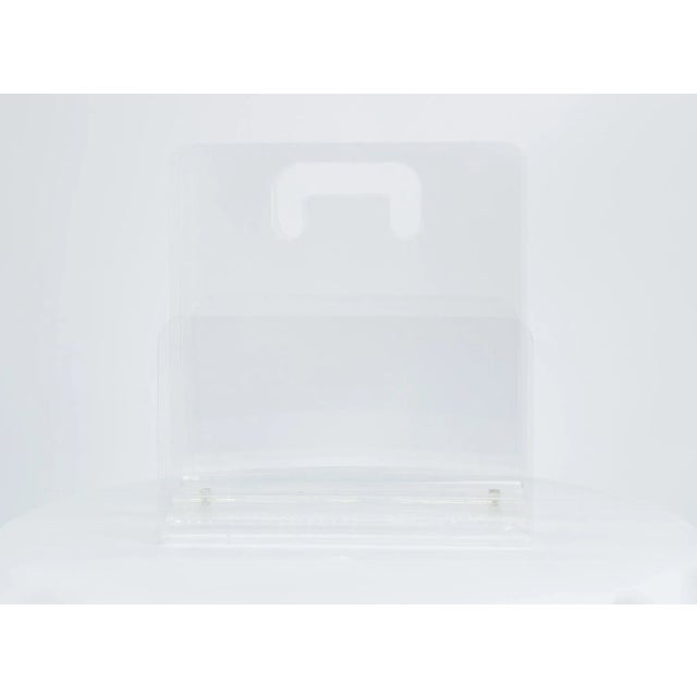 Mid Century Lucite Magazine Rack This piece measures: 12 wide x 7.5 deep x 13 inches high and weighs 5.3 pounds We take...