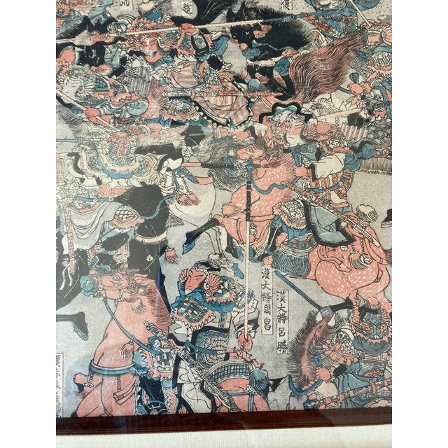 From a family who lived in Japan , this is a framed Japanese ukiyo-e woodblock print depicting a chaotic samurai battle...