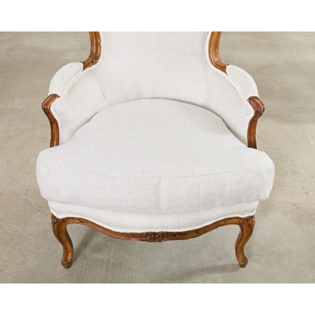Pair of French Louis XV Style Walnut Bergeres With Linen For Sale - Image 11 of 18