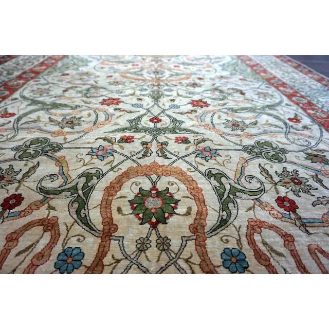 Handmade vintage Turkish Hereke rug made in natural silk and prayer design. The rug is from the middle of 20th century in...