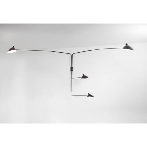 Wall lamp model 'four rotating straight arms wall lamp' designed by serge mouille in 1954. Manufactured by editions serge...