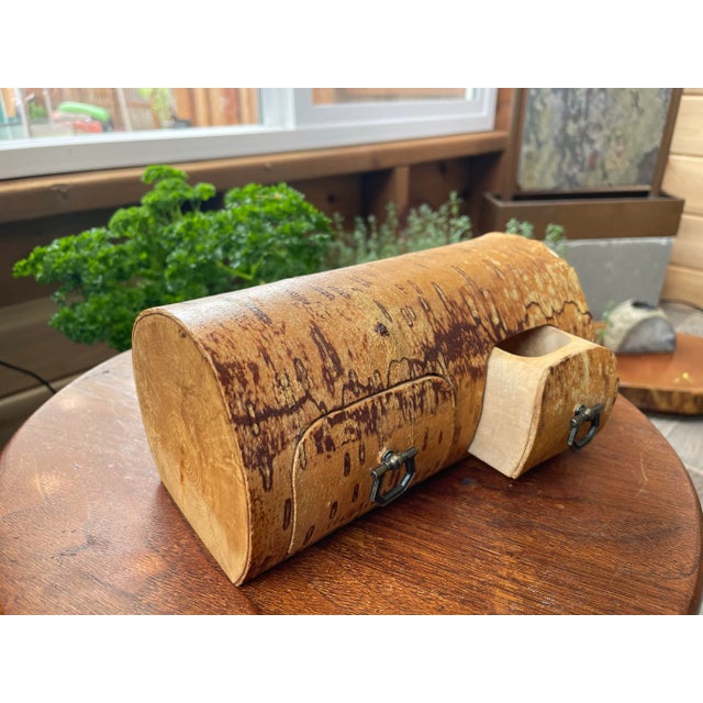 Bring a piece of the forest into your bedroom with this lovely aged-log jewelry box. The bark has a wonderful color and...