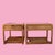 A charming pair of split-rattan nightstands, each with a single drawer and an open lower shelf. The honey-toned frames...