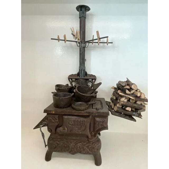 Magnificent miniature toy wood stove. Model of old wood stove, 1950-60s. Rustic style, Italy/Lombardy, Width 30 cm Depth...