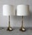 Stunning pair of sculptural brass table lamps by Hart Associates, featuring elegant flared petal bases and tall,...