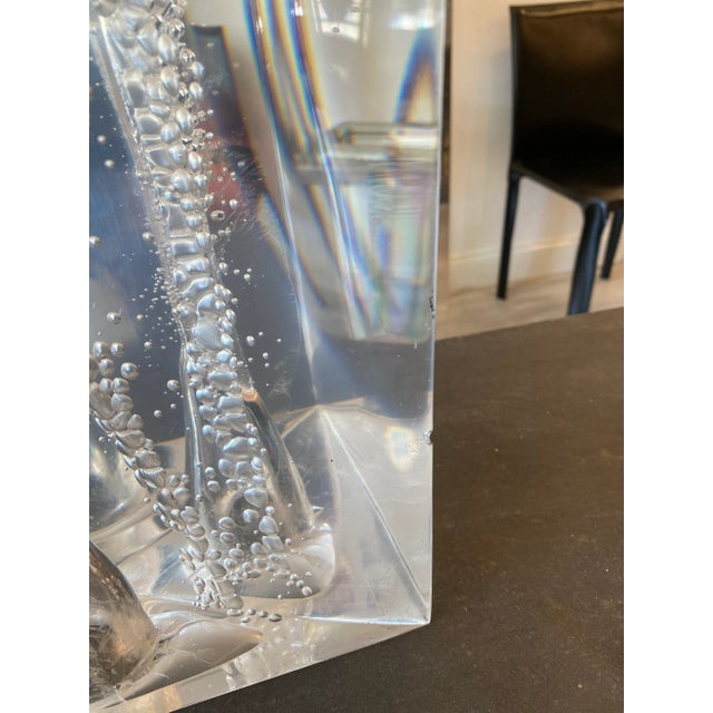 This is a lucite sculpture in a prism shape that has been fractured in the center. This piece is large in size with a very...