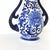 Elegant and timeless, this **Vintage Seymour Mann China Blue Porcelain Vase** showcases the classic beauty of...