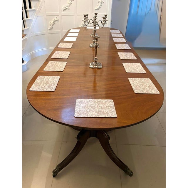 A superb quality Georgian three pillar extending dining table in the finest mahogany of excellent scale and proportion....