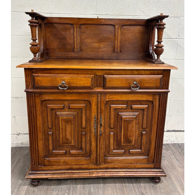 This is a stunning antique French Renaissance Revival Henri II Style Two-Piece Buffet Deux Corps from the late 19th to...