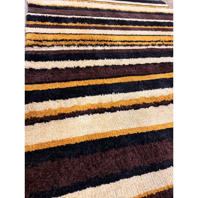 This is a spectacular and highly authentic mid-to-large antique European Art Deco wool rug, Hand-knotted circa 1925 during...