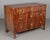 A fine 19th century Biedermeier commode from Austria made with beautifully patterned book matched veneer of walnut over...