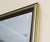 A rectangular, beveled Italian mirror from the 1960s. The beveled glass beautifully captures the light, creating subtle...