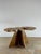 This handcrafted sculptural table is a one-of-a-kind functional artwork, defined by an organically shaped live-edge top...