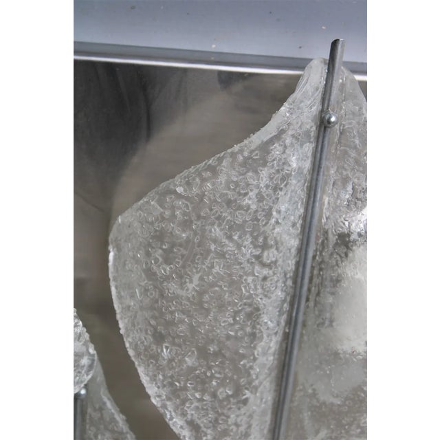 Italian Murano Glass Wall Lamp from Mazzega, 1970s, in Very Good conditions. Designed 1970 to 1979 This piece is...