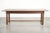 This antique 18th-century dining table, which seats 6 to 8 people, is made of oak and has a sturdy appearance. The table...