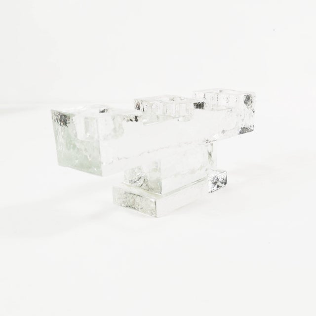 This candle holder originated in Germany in the 1960s. It is characterized by its monumental shape. Made of thick cast...
