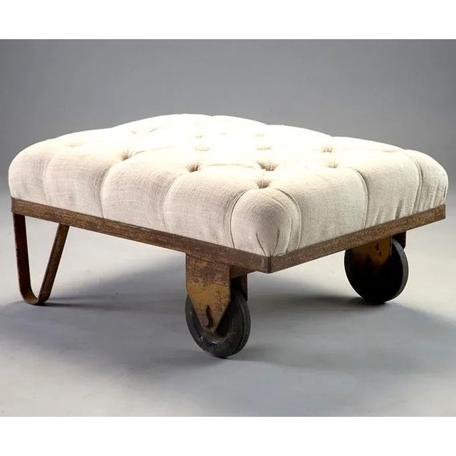 Stool, ottoman or bench made with circa 1930s industrial factory wheelbarrow base. Found in Europe, the base cast metal...