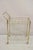 Vintage Mid Century Modern Gold Metal 2 Tier Rolling Bar Tea Cart Server. Circa Mid 20th Century. Measurements: 35" H x...