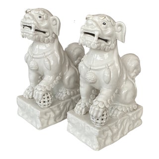1960's Blanc De Chine Porcelain Foo Dogs by Wai Ming Hong Kong - Pair For Sale