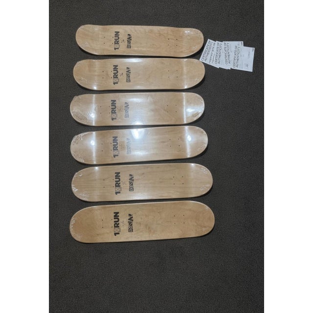 Sealed set of six DENIAL x 1xRUN Supreme Vuitton Smashup Pill skateboard decks from 2022, released for Go Skate Day. Each...