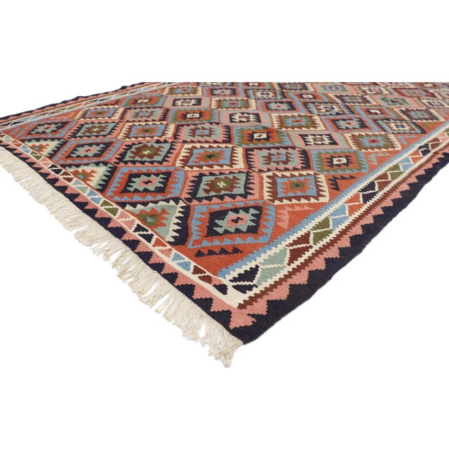 77923 Vintage Persian Shiraz Kilim Rug with Southwestern Tribal Style 06'06 x 09'02. Full of tiny details and a bold...