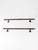 Pair of antique early 20th-century iron handrails with substantial tubular rails, ball finials, and cast circular wall...