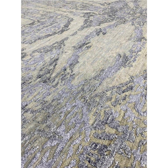 Exact Size: 8'1" x 10'5" Color: Gray Age: New Materials: Wool, Bamboo Silk Construction: Hand Knotted Origin: India