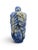 Hand carved Chinese snuff bottle made from natural Lapis Lazuli stone. Showing relief carved organic or vegetative leaf...